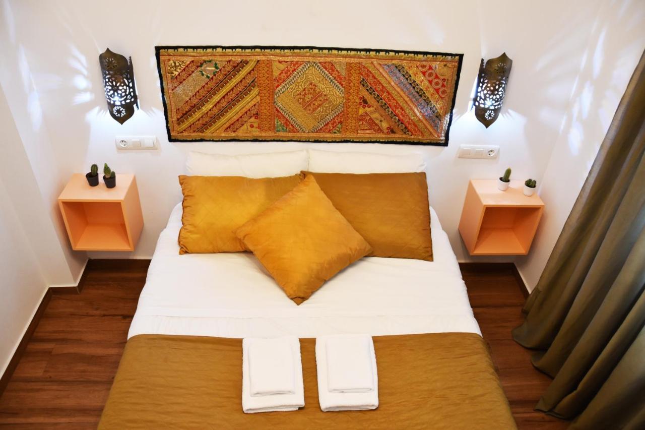 Puerta Real Apartamentos Севилья Экстерьер фото